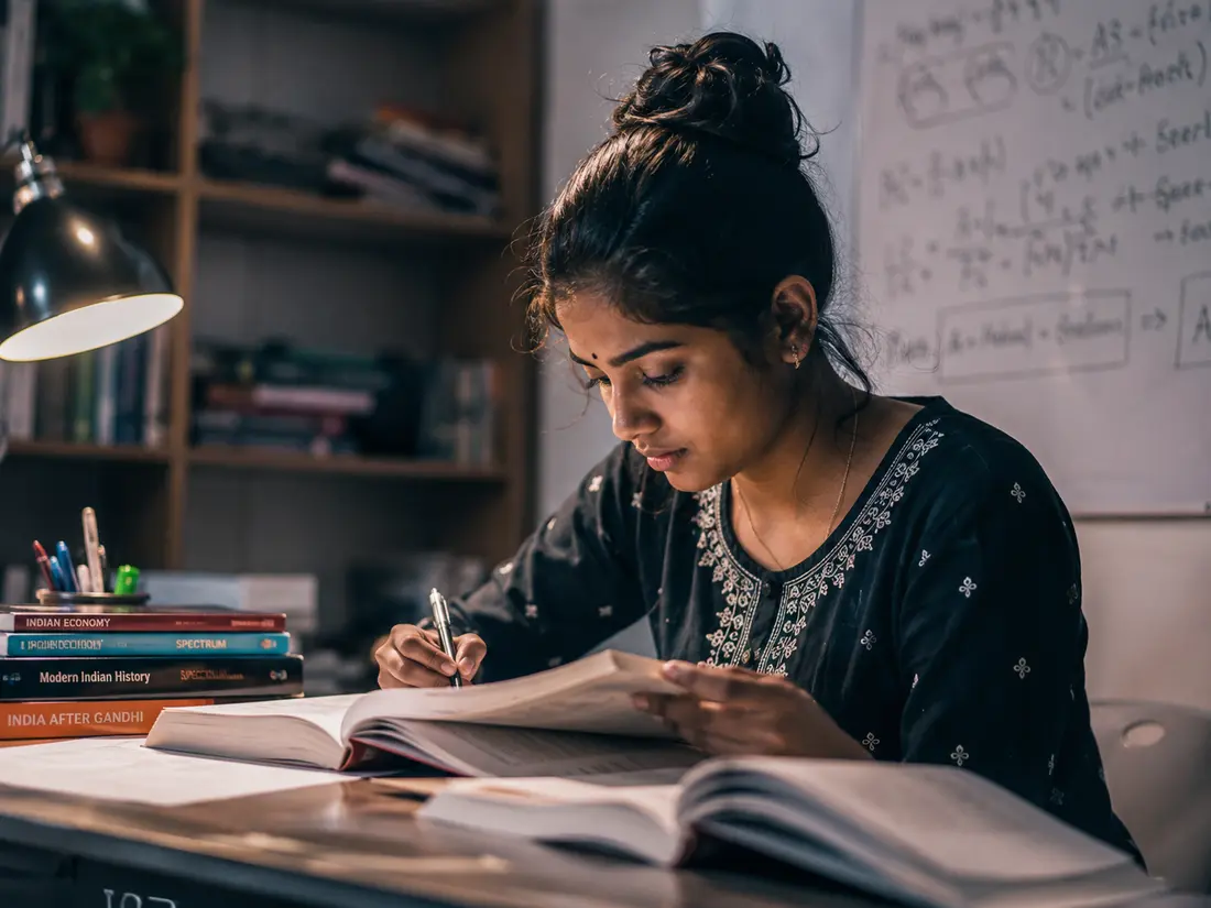 A young woman student actively engaged in learning
